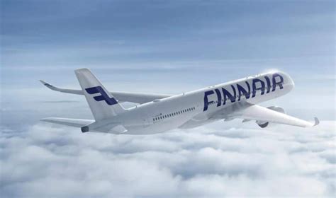 finnair checked bag fee.